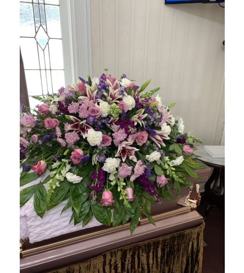 Pastel in Lavender and White Casket Spray