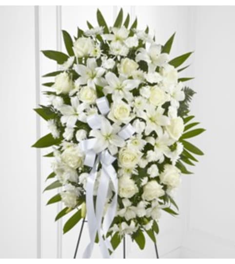 Tribute Standing Spray. An arrangement by Petals and Co..