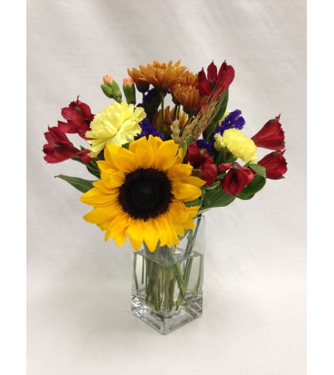 Autumn Treasures Vase Arrangement. An arrangement by Balloon Bouquets Plus.