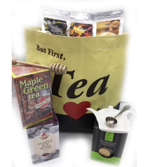 Afternoon Tea Gift Basket. An arrangement by The Village Green Florist.