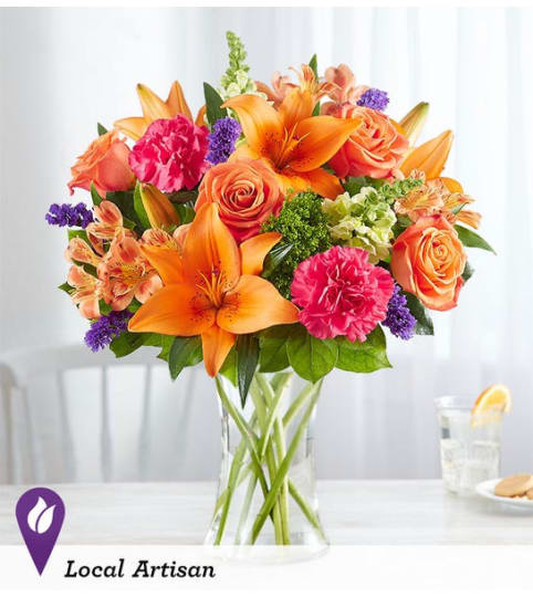 Vibrant Floral Medley 2021. An arrangement by Royal Louis Florist.