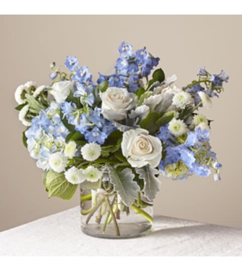Clear Skies Bqt. An arrangement by Petals and Co..