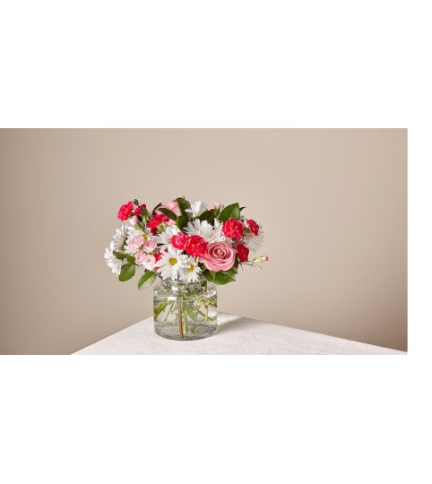 FTD SWEET SURPRISE VASE. An arrangement by Novak's Flower Shoppe.