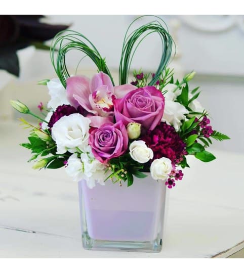 Love Songs. An arrangement by Loyalist Flowers.