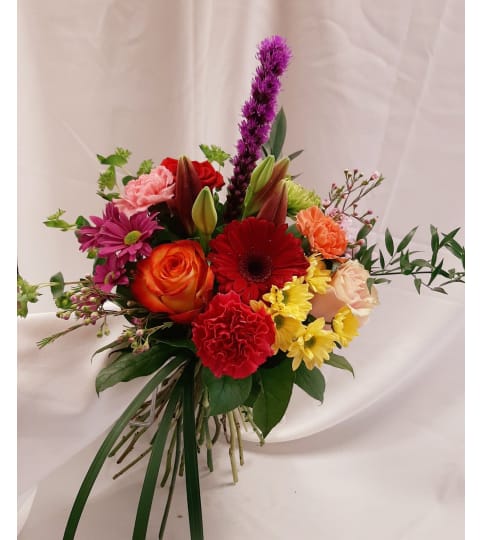 Designer Choice from the Garden, Hand tied Bouquet. An arrangement by Nicol Florist.