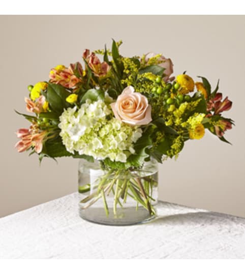 21-S7 FTD Lifes a Peach Bouquet. An arrangement by Blossoms On The Trail.