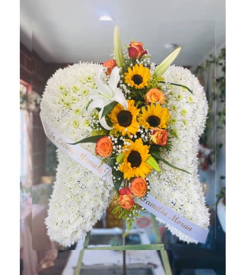 SUN SHINE WINGS. An arrangement by Geni's Florist and Gifts.