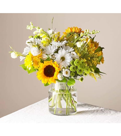 The Sunshine Sunflower Bouquet. An arrangement by Rennix Flowers.
