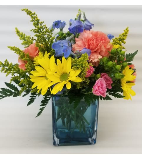 Blue Wonder Cube. An arrangement by Clemmons Florist Inc..
