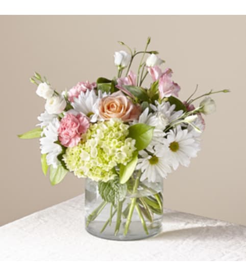 Flutter By Bqt. An arrangement by Petals and Co..
