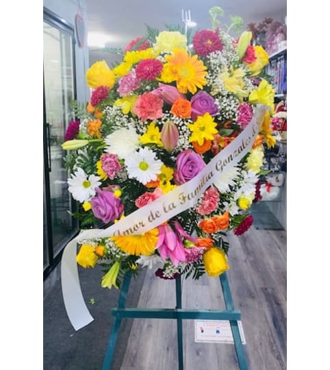 SPRAY MIX. An arrangement by Geni's Florist and Gifts.