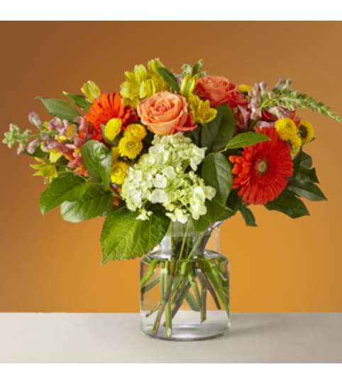 Glowing Autumn Bouquet. An arrangement by Petals and Co..