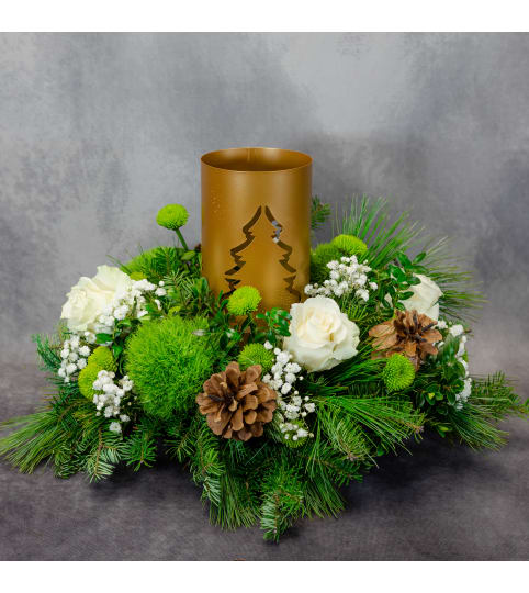 Royal Christmas Centerpiece by Conny's Flower Shop. An arrangement by Conny's Flower Shop.