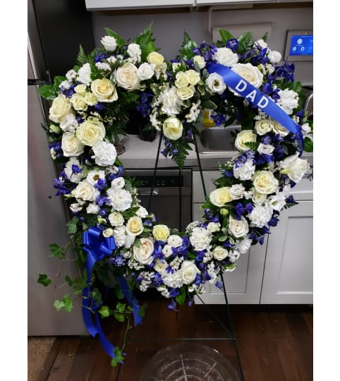 Royal Blue and White Open Heart. An arrangement by Flowers By Fiore.