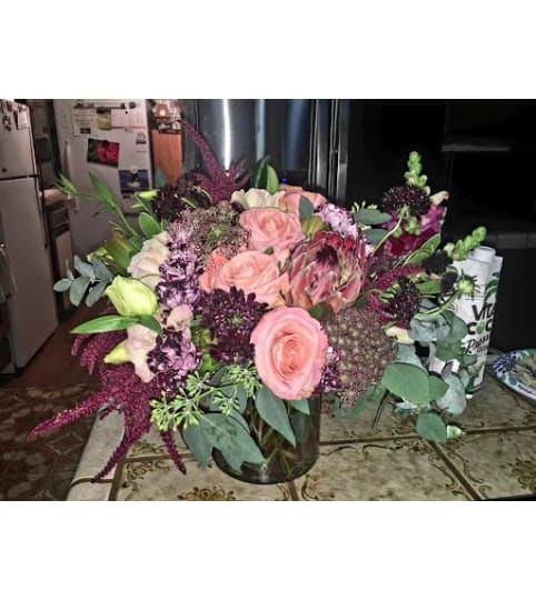 THIS COULD BE LOVE. An arrangement by Rosemar Flowers and Gifts.
