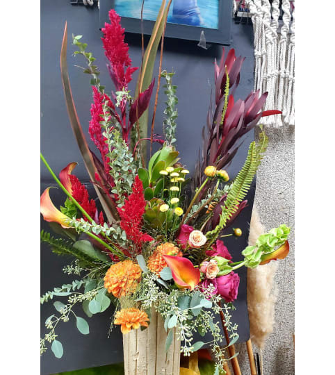 HI-STYLE TROPICS. An arrangement by Rosemar Flowers and Gifts.