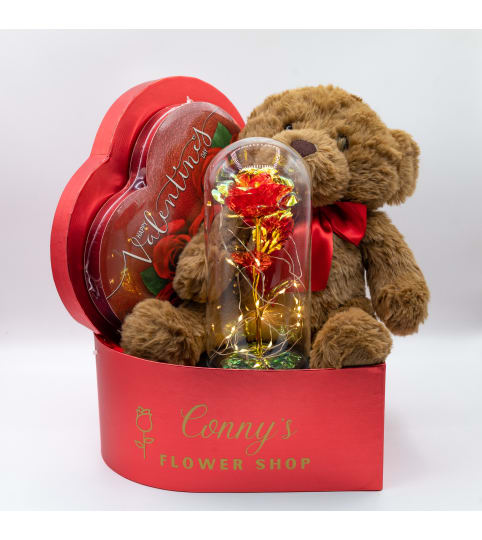 Eternal Rose and Teddy Bear with Chocolate. An arrangement by Conny's Flower Shop.