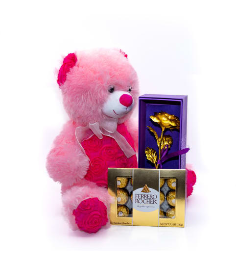 Golden Rose with Teddy Bear and Chocolates. An arrangement by Conny's Flower Shop.