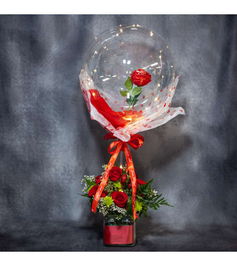 Red Romance Ballon Bouquet. An arrangement by Conny's Flower Shop.
