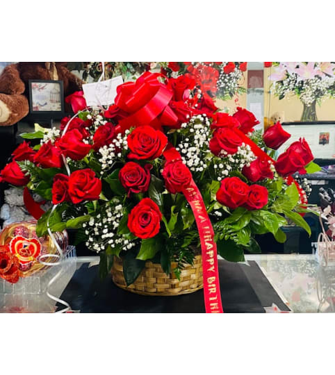 Red Roses Basket. An arrangement by Geni's Florist and Gifts.