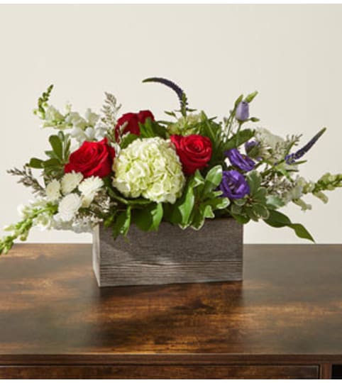 FTD Sweet Magnolia. An arrangement by Pierson's Flower Shop and Greenhouses.