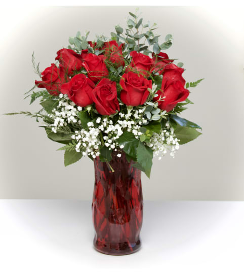 Sweet Talk with 12 red roses. An arrangement by Say It With Flowers.