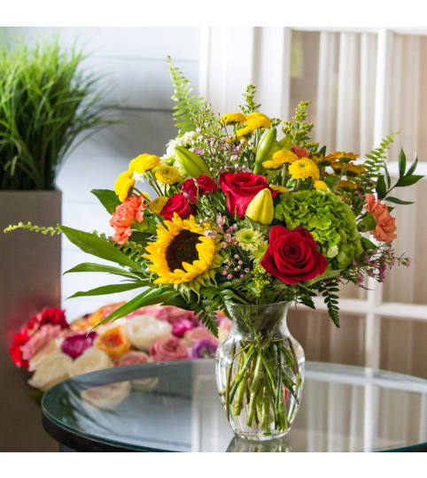 Chasing The Sun. An arrangement by Loyalist Flowers.