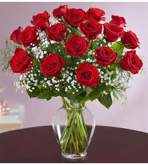 Rose Elegance Premium Long Stem Red Roses 2022. An arrangement by Royal Louis Florist.