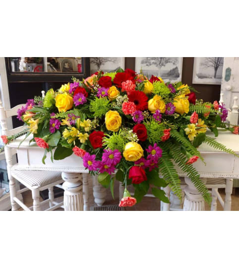 Loving Remembrance Blanket. An arrangement by Loyalist Flowers.