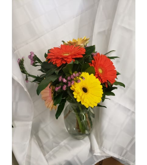 Smile a day. An arrangement by Jane's Floral Dreams.