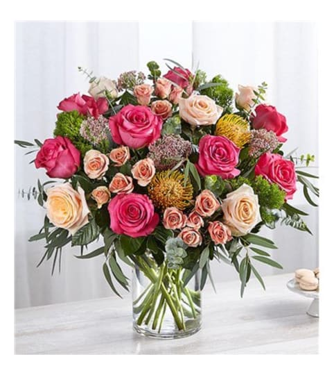 Charming In All Ways. An arrangement by L and J Blooms.