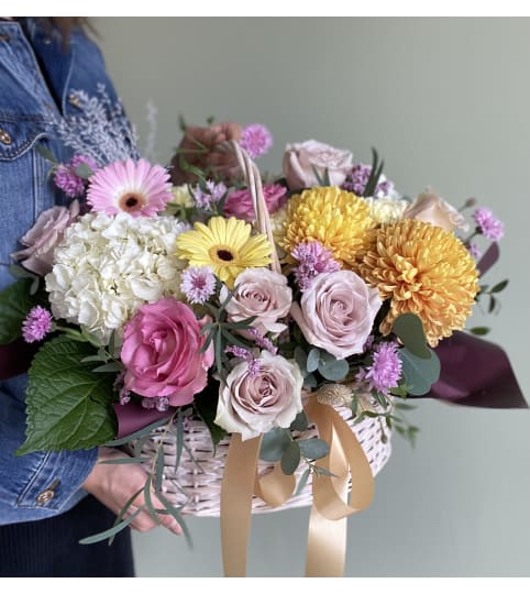 Seasonal Mixed Flower Basket. An arrangement by Mayfield Flowers.