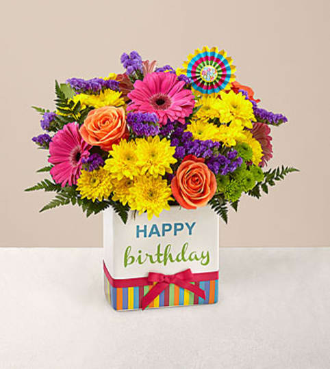 Bright Birthday Celebration. An arrangement by The Village Green Florist.