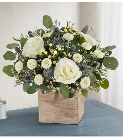 Country Pearl. An arrangement by L and J Blooms.