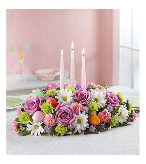 Easter Centerpiece by Conny's Flower Shop. An arrangement by Conny's Flower Shop.