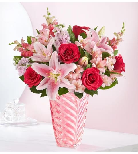 Moms Pinky Heart. An arrangement by L and J Blooms.