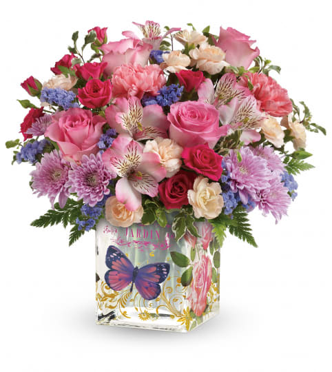 The Enchanted Garden Bouquet (Teleflora). An arrangement by Sueppel's Flowers.