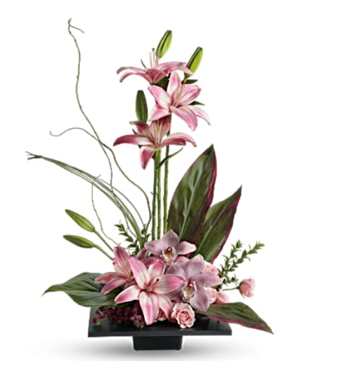 Elegant Imagination Blooms with Cymbidium Orchids. An arrangement by Elegant Florist.