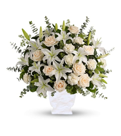 Serene White Tribute. An arrangement by Tallevast Florist.