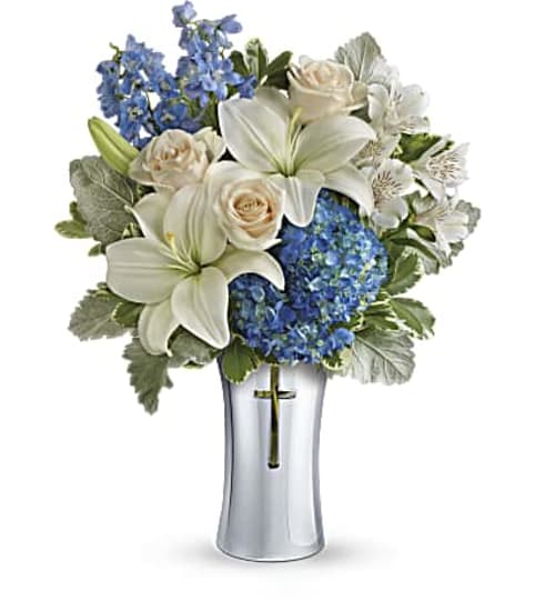 Blue Skies Of Remembrance Bouquet. An arrangement by Tallevast Florist.
