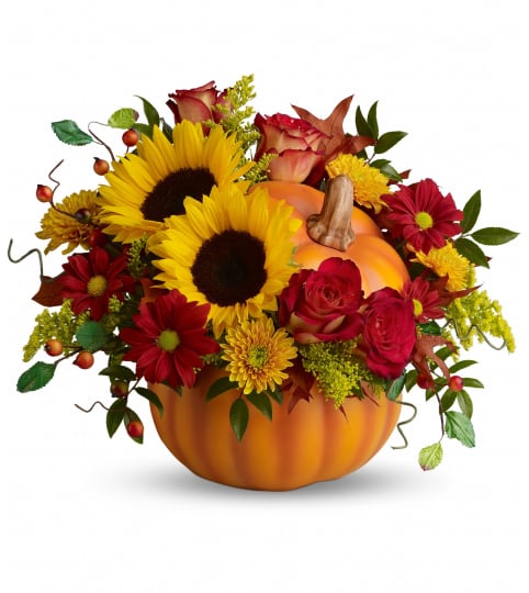 The Pretty Pumpkin Bouquet (Teleflora). An arrangement by North Liberty Flower Shop.