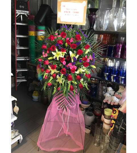 Stunning Standing Grand Opening Arrangement. An arrangement by Flamingo Floral and Gifts.