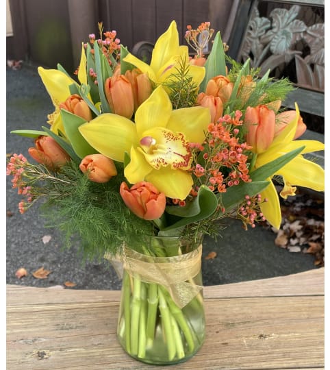 Tulips and Orchids. An arrangement by Violeta's Flower Shop.