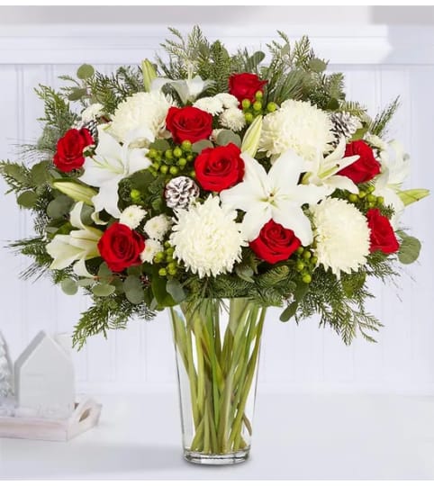 Grand Christmas Celebration. An arrangement by L and J Blooms.