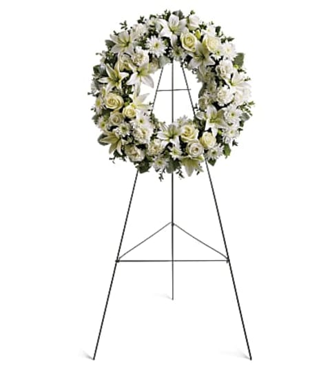 WHITE CLOUD WREATH. An arrangement by Brasco Florist.
