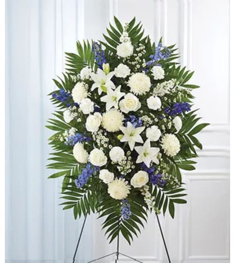 BLUE SKIES STANDING SPRAY. An arrangement by Brasco Florist.
