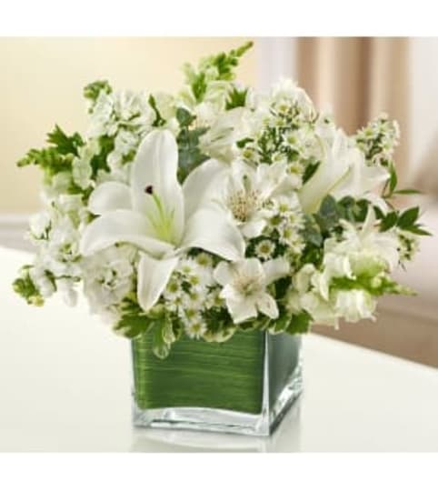 WITH SORROW. An arrangement by Brasco Florist.