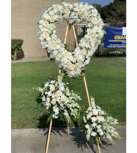 Beloved Departed. An arrangement by Rose Flowers.