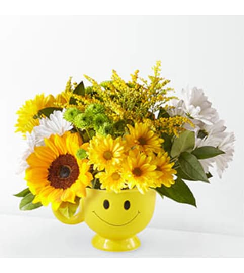 FTD Hello Sunshine Smiley Mug. An arrangement by Balloon Bouquets Plus.