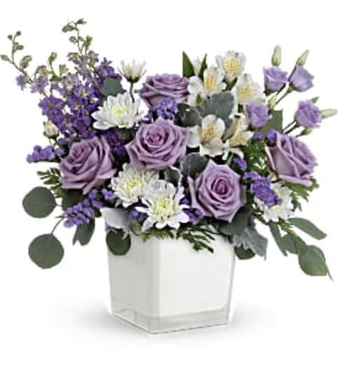 Honey Lavender Blooms TEV66-6A. An arrangement by Jennifer's Flowers and Gifts.